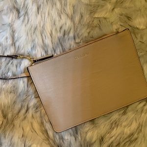 Calvin Klein cream wristlet